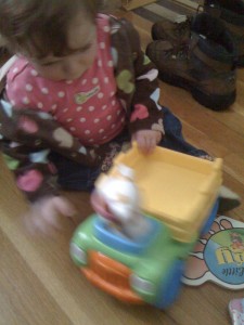 IMG_0674 Abi plays with her first truck